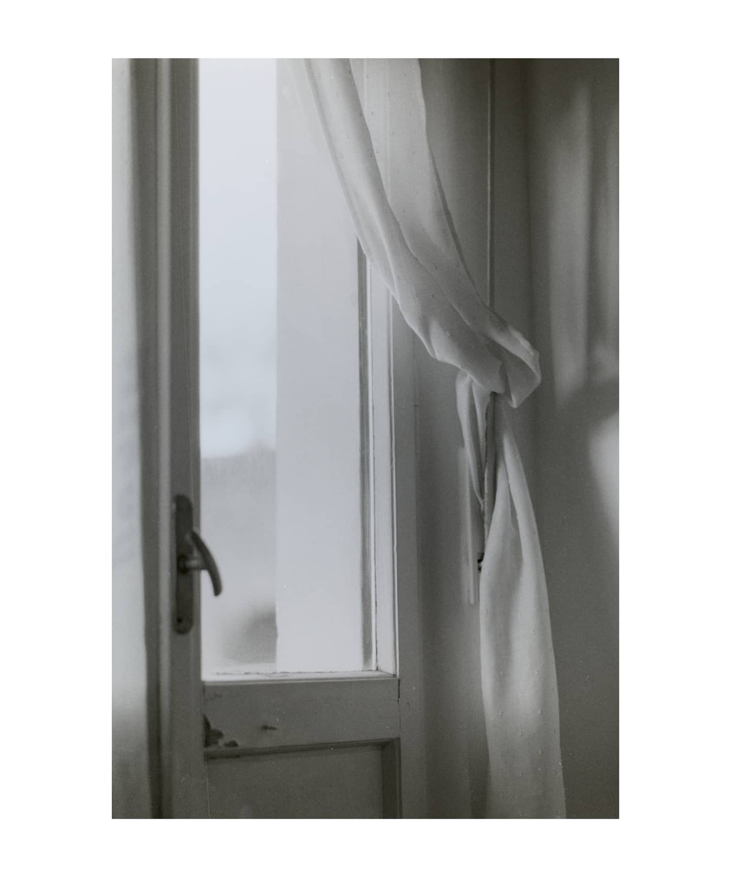 Window with a tied curtain